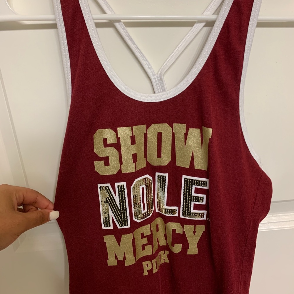 Pink Florida State University tank top.